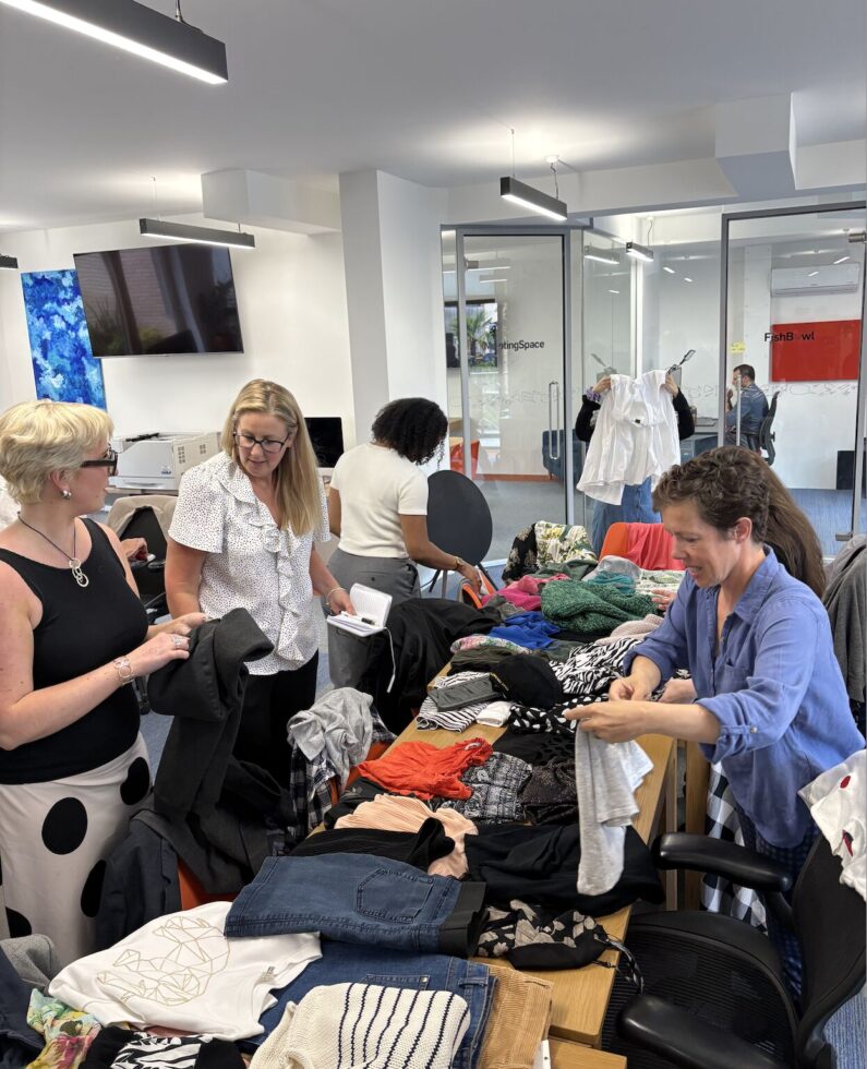 image depicting the Cegos UK team leading a clothes swap as a part of a corporate social responsibility initiative reimagined from the bottom up.